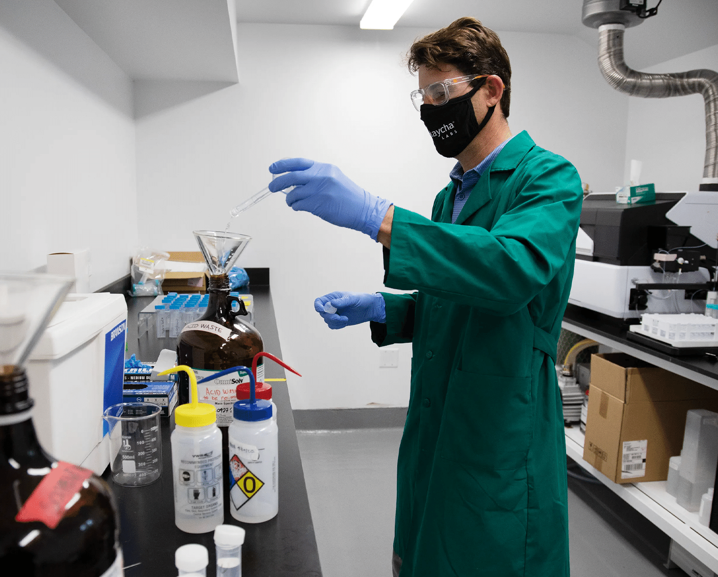 Lab worker testing and creating CBD for first responders and more.