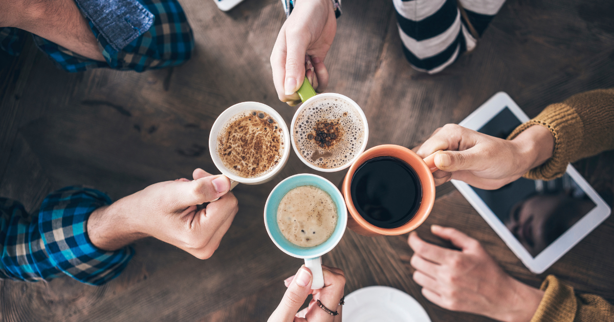 friends with cbd in their coffee cheering