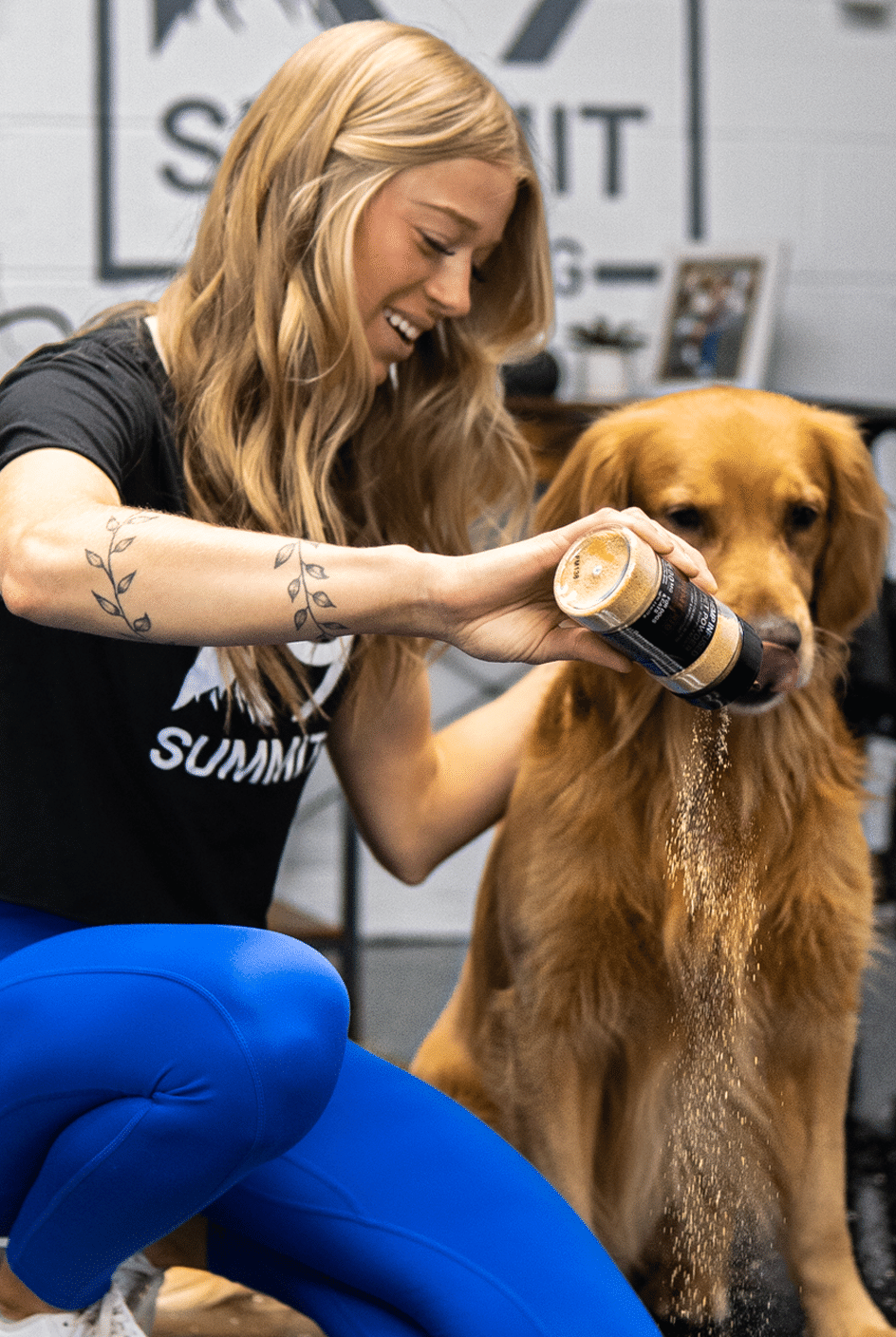 Female dog owner gives CBDOps hemp infused CBD pet powder product to help with her dogs stress and pain.